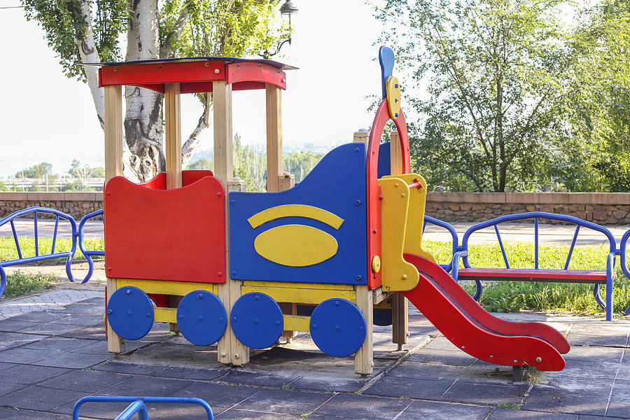 Outdoor play equipment being cleaned
